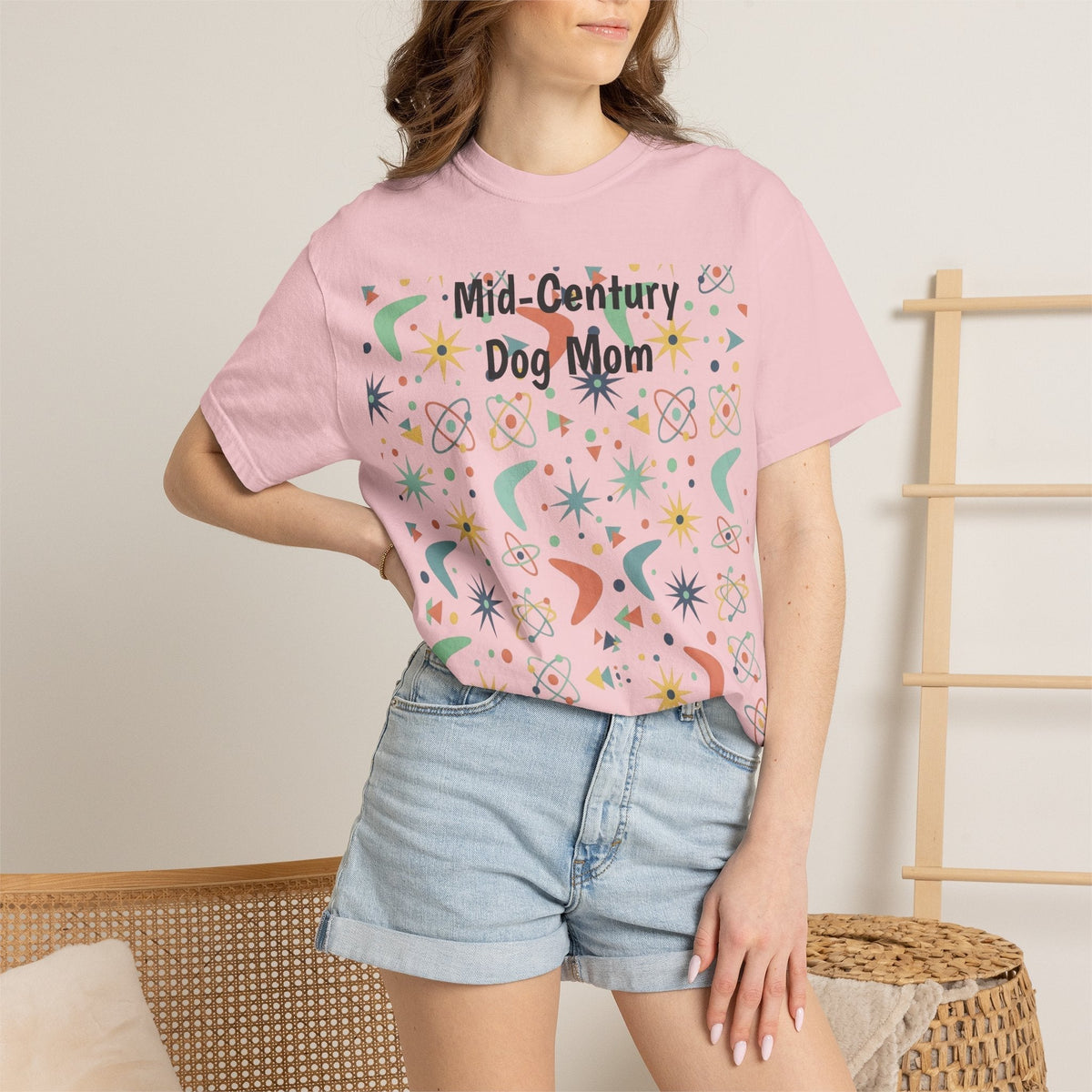 Paws And Printables light pink cotton t-shirt featuring a retro mid-century atomic star and boomerang graphic print.